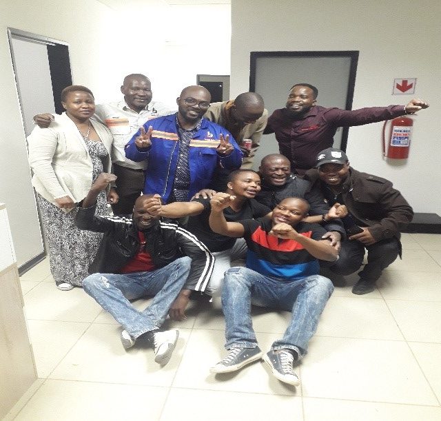 Bowout team indoors
